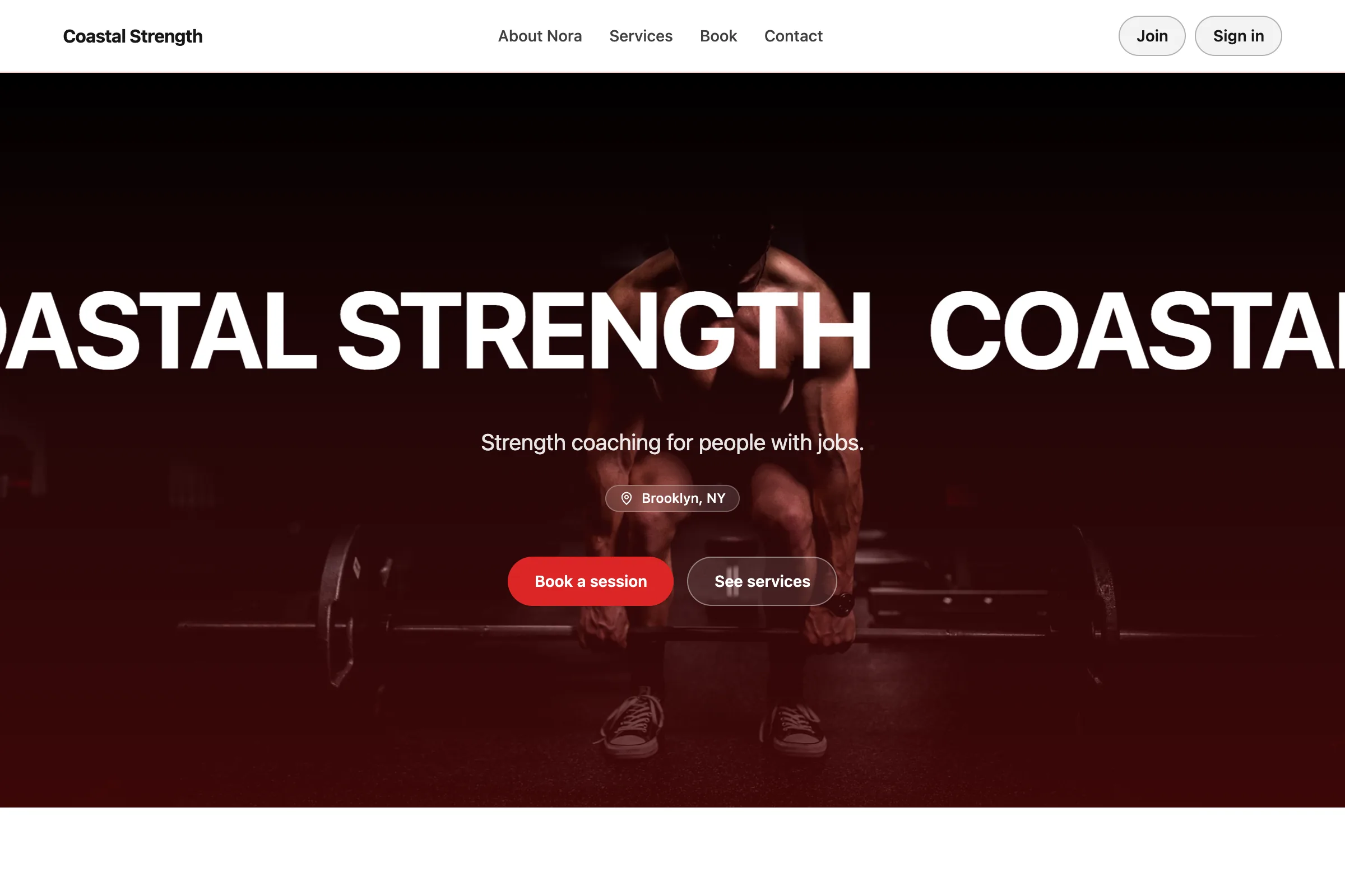 The same site in the Crimson palette with the Marquee layout: the business name at billboard size running edge to edge.